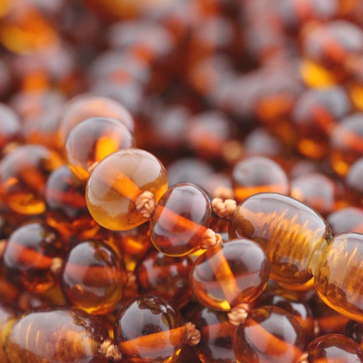 close-up-amber-necklace-cognac-color